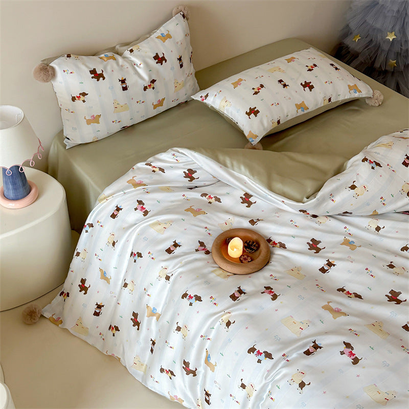 Children's bedding set with pompom corners and playful animal and heart print