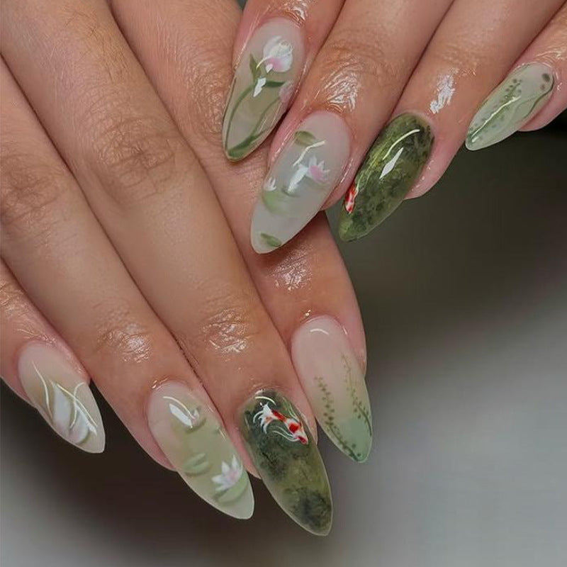 Acrylic nail set with floral designs and elegant accents Stornfield
