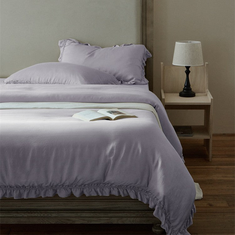 Duvet cover set made of high-quality cotton percale with ruffle edge