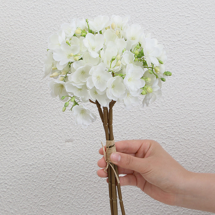 Artificial flower bouquet with delicate blooms