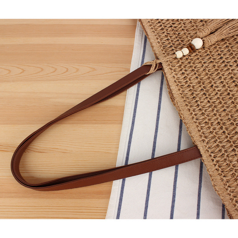 Handbag Made of Braided Natural Material with Tassel Decoration Stornfield