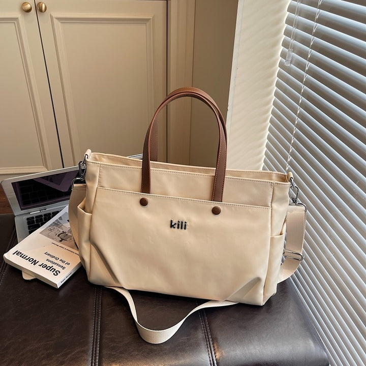 Shopping bag with comfortable carrying system and practical outer pockets Stornfield