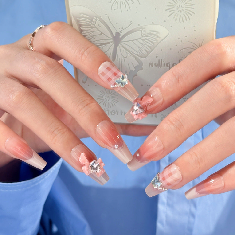 Artistic Press-On Nail Set with Elegant Floral and Decorative Accents Stornfield