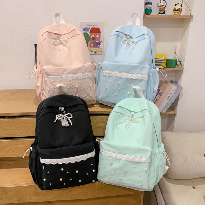 Backpack with elegant pearl applications and intricate design Stornfield