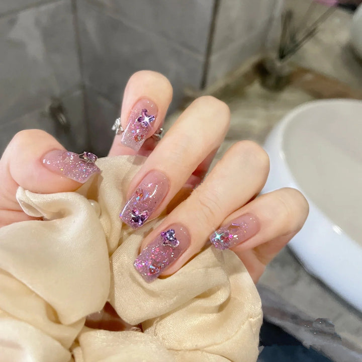 Glamorous artificial nails with sparkling accents Stornfield