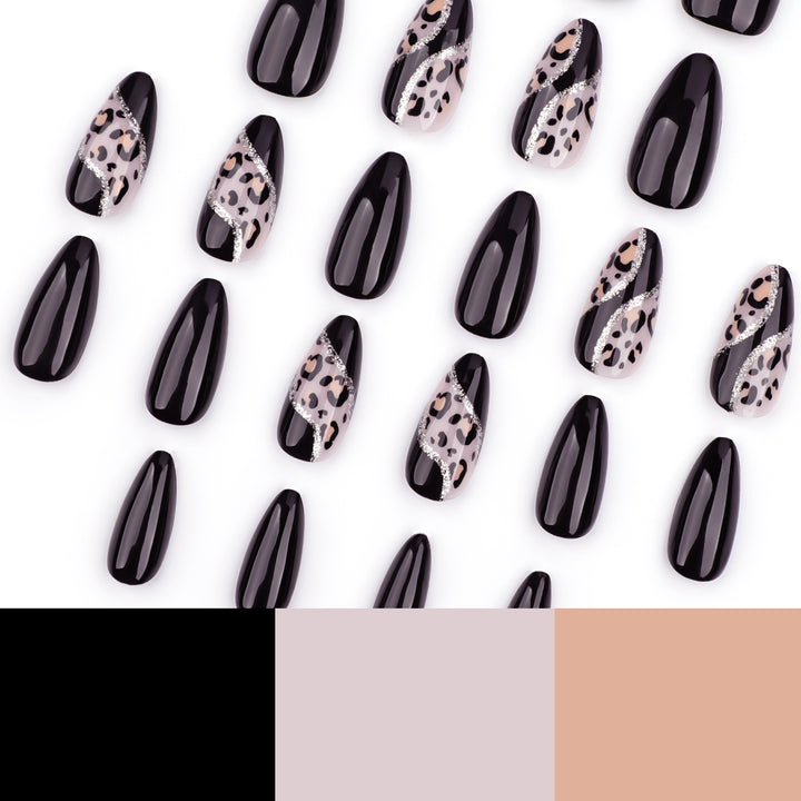Artistic stiletto nails with leopard design and glitter effects Stornfield