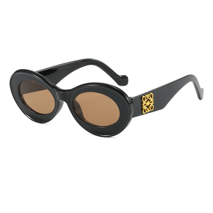 Women's fashionable sunglasses with oval frame and golden applications Stornfield