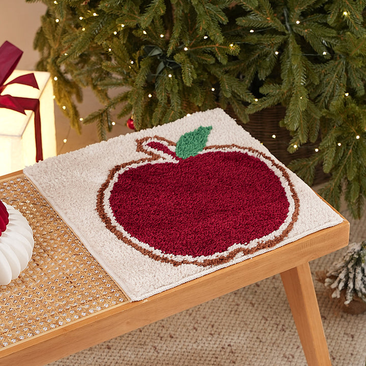 Tufted Christmas placemat with gingerbread house motif Stornfield