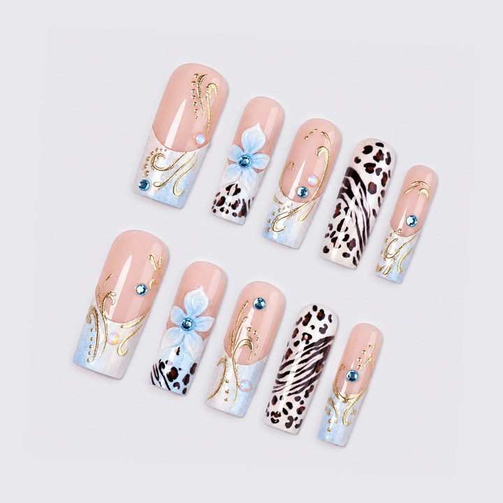 Glamorous artificial nail set with floral accents and glitter details Stornfield
