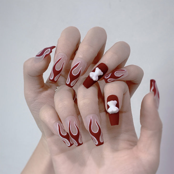 Artful stiletto nails with fiery flame design Stornfield