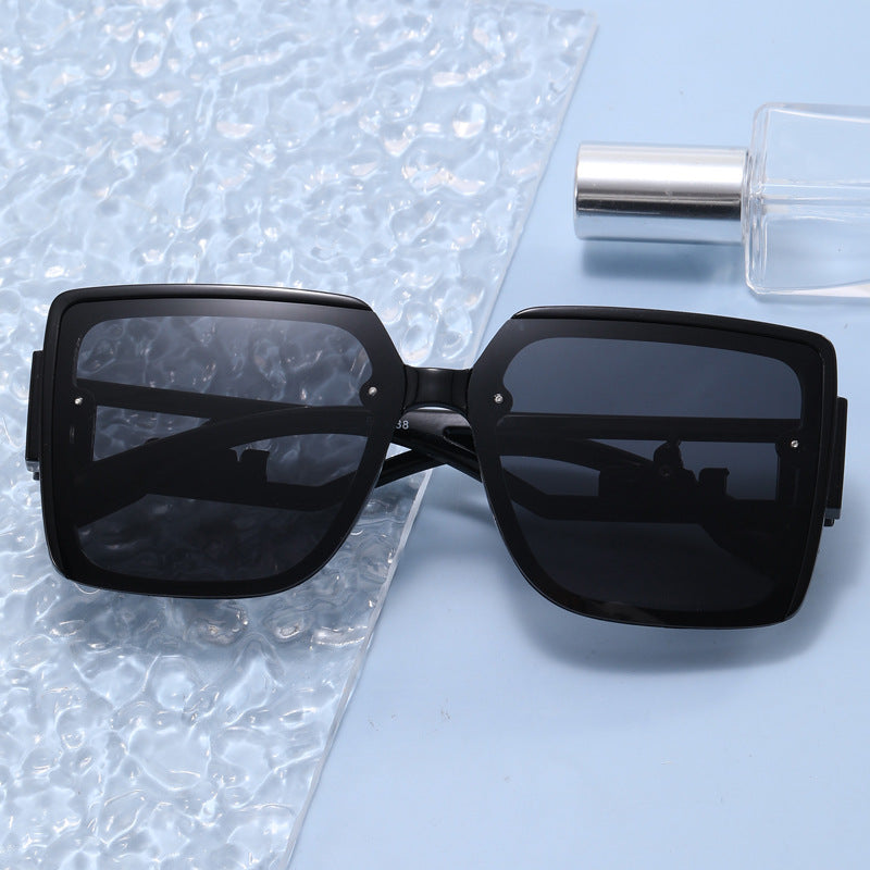 Ladies square designer sunglasses with elegant embellishments Stornfield