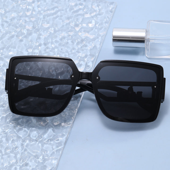 Ladies square designer sunglasses with elegant embellishments Stornfield