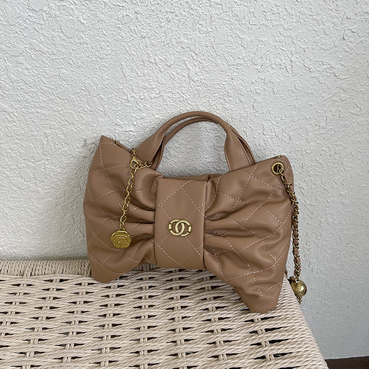 Quilted Bow Accent Handbag