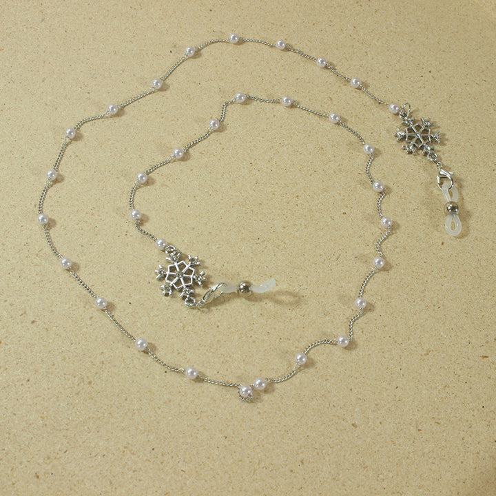 Elegant glasses holder chain with pearls and snowflake pendant Stornfield