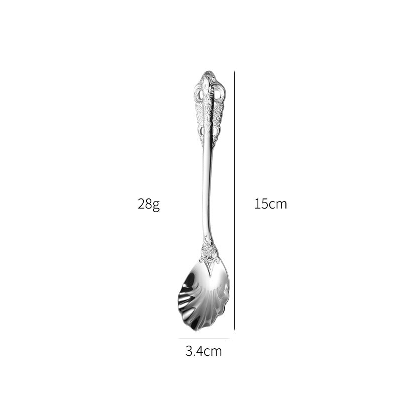 Elegant fish fork with artistic handle design Stornfield