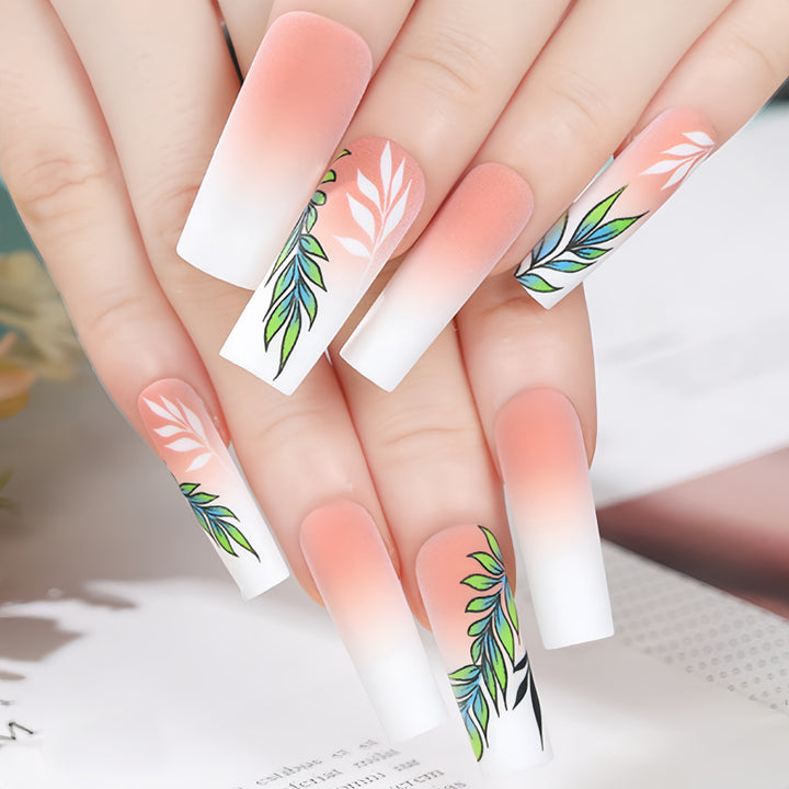 Artificial nails with elegant ombre design and floral accents Stornfield