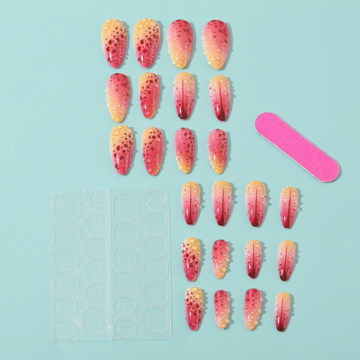 Creative artificial nails with appealing ombre and glitter effects Stornfield