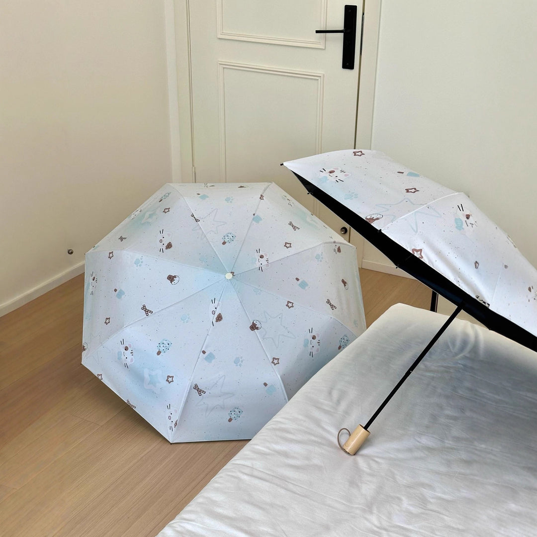 Women's compact folding umbrella with cute Stornfield motif