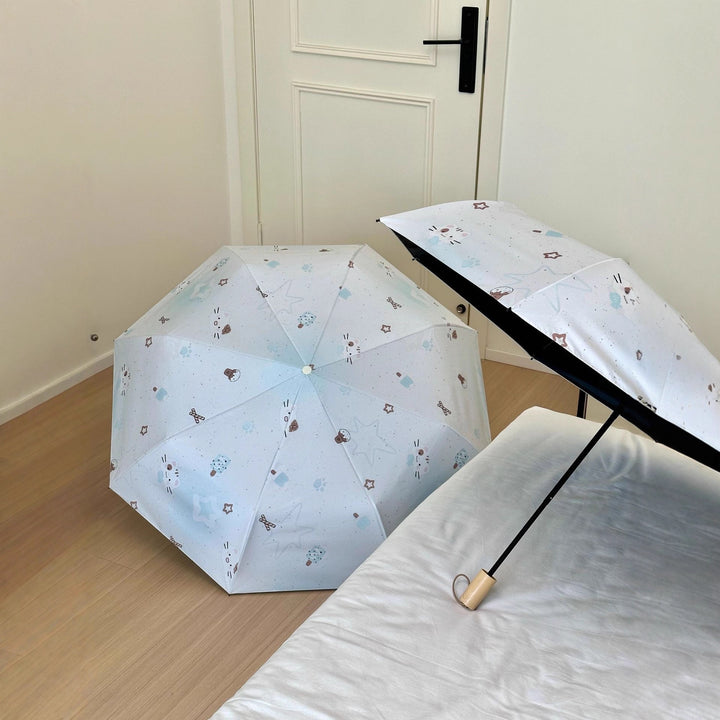Women's compact folding umbrella with cute Stornfield motif
