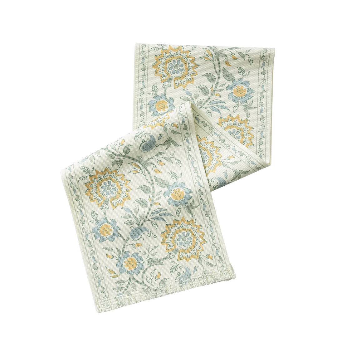 Woven decorative table runner with floral medallion borders and fringes Stornfield