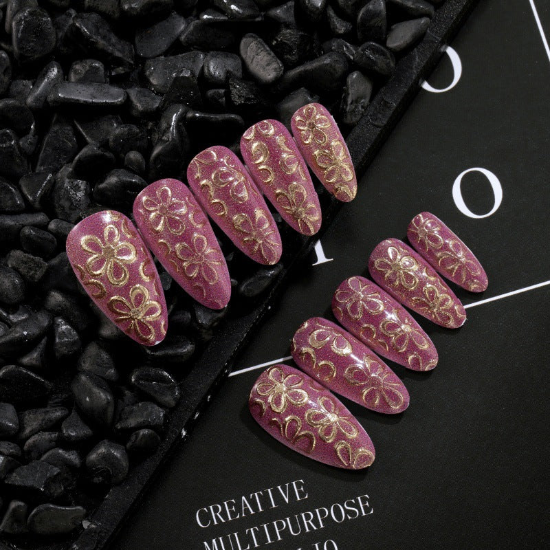 Glittering artificial nails with floral patterns Stornfield