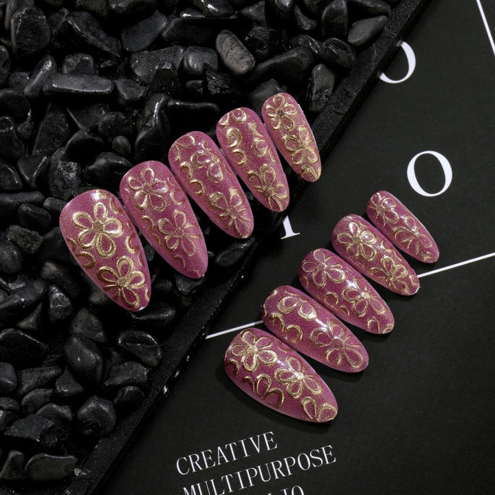 Glittering artificial nails with floral patterns Stornfield