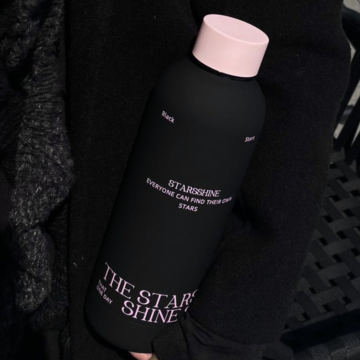 Women's insulated bottle with ergonomic design and practical carrying strap Stornfield