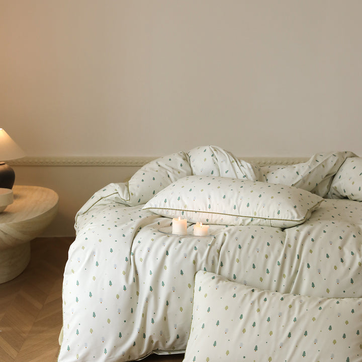 Cotton satin bed linen set with small tree print and contrast piping