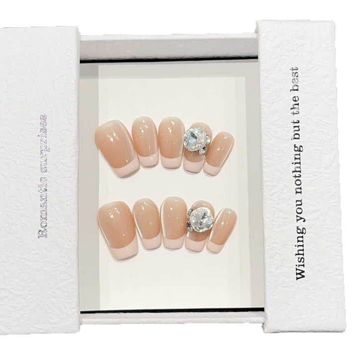 Artificial nail tips with elegant rhinestone accents Stornfield