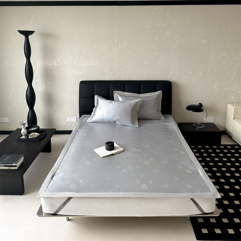 high-quality non-slip mattress protector with integrated fitted sheet and elegant jacquard pattern