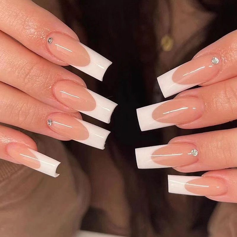 Artful Nail Extensions with Elegant French Tips Stornfield