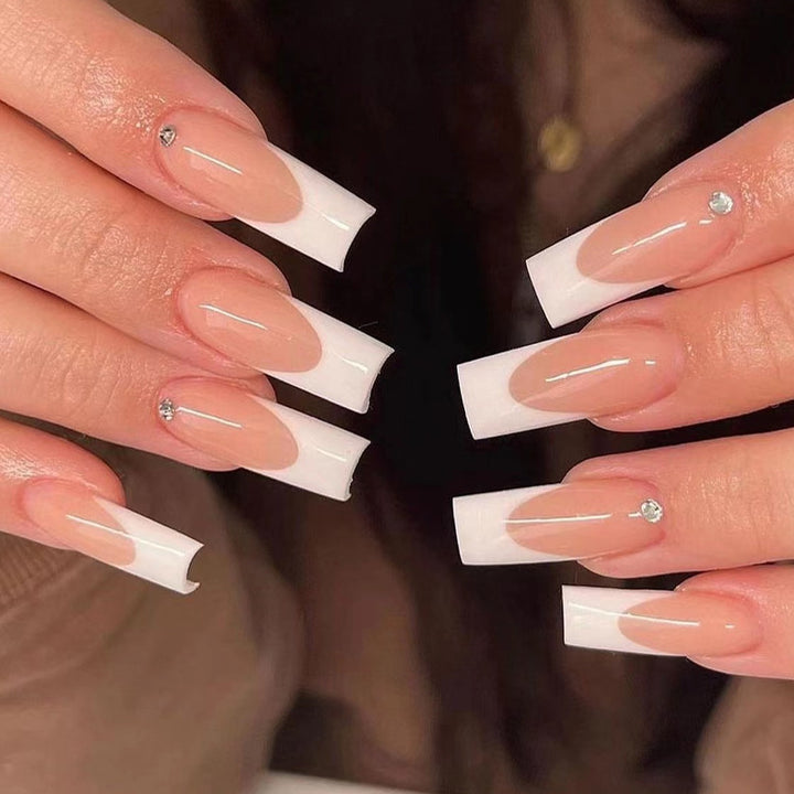 Artful Nail Extensions with Elegant French Tips Stornfield
