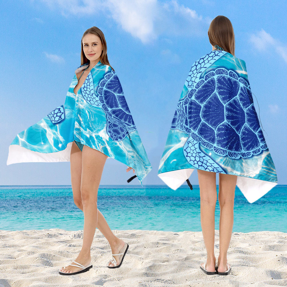 Hooded beach poncho with mandala motif Stornfield