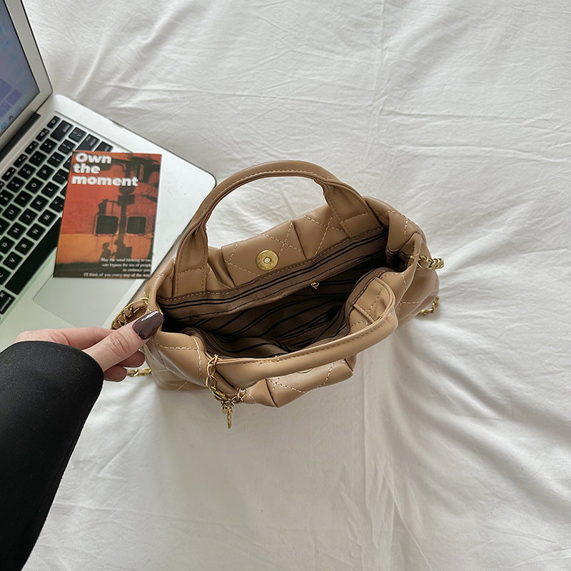 Quilted Bow Accent Handbag