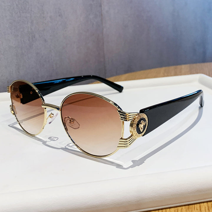 Ladies elegant sunglasses with luxurious metal frame and mirrored lenses Stornfield
