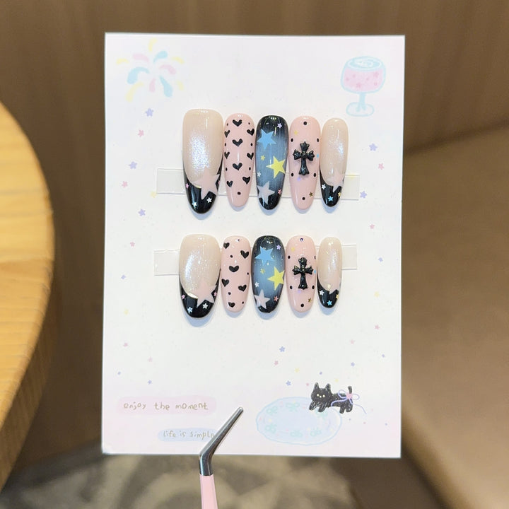 Artificial nail tips with playful star and heart designs Stornfield