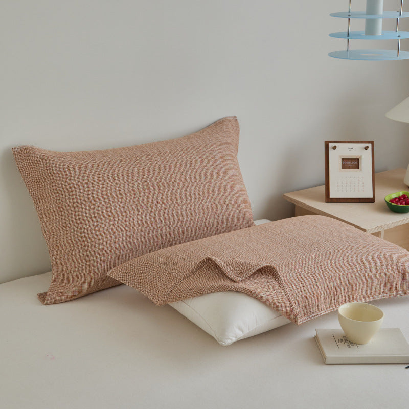 Textured cushion cover set made of cotton-linen blend with waffle structure