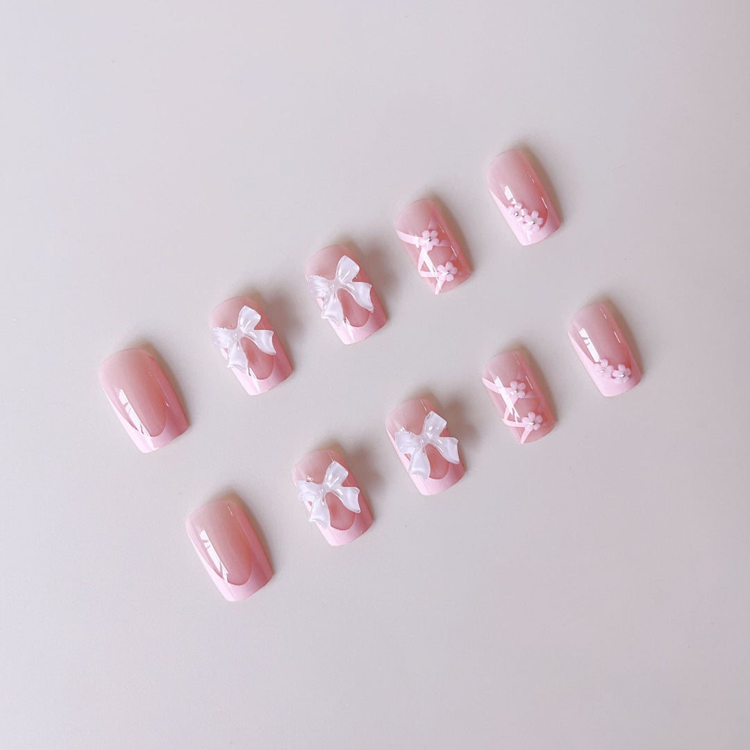 Artificial nail set with filigree 3D flowers and bows Stornfield