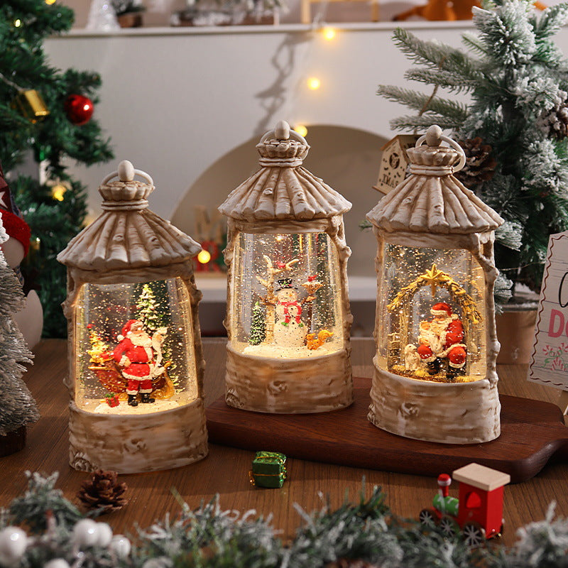 Illuminated Christmas lantern with snow scenes Stornfield