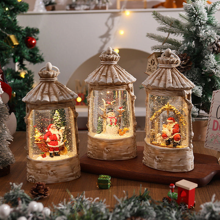 Illuminated Christmas lantern with snow scenes Stornfield