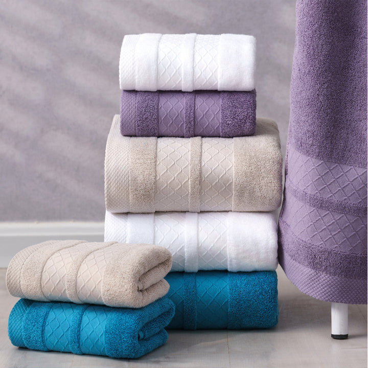 Large premium terry bath towel with decorative structure border