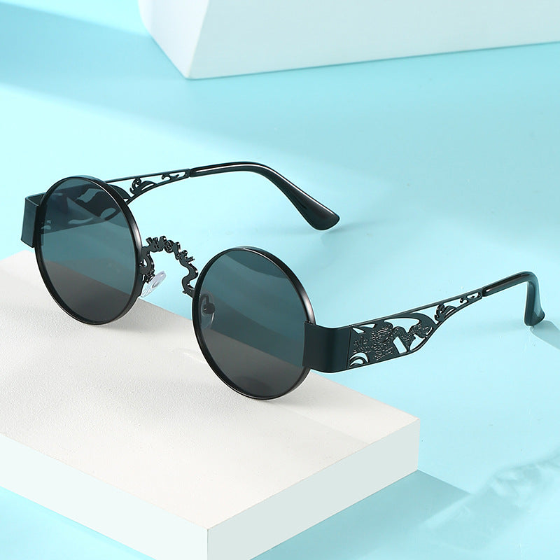 Women's artistic round sunglasses with elegant filigree frame Stornfield