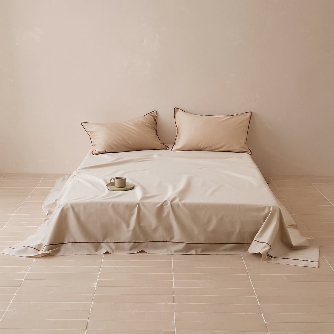 Noble cotton satin bed sheet and pillowcase set with fine piping