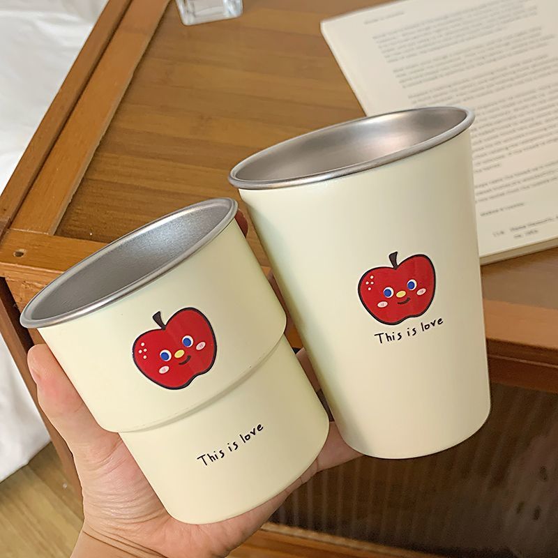 Multifunctional ceramic mug with cheerful apple design Stornfield