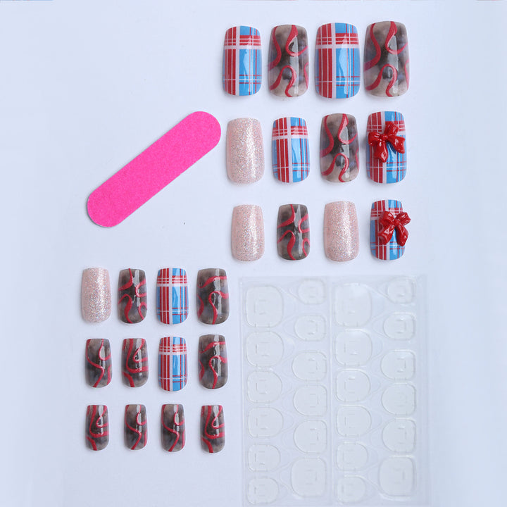 Artificial nails with festive gift design and glitter Stornfield