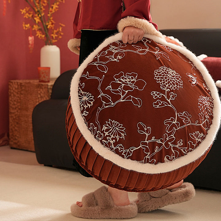 Round velvet decorative bench with floral embroidery and faux fur trim