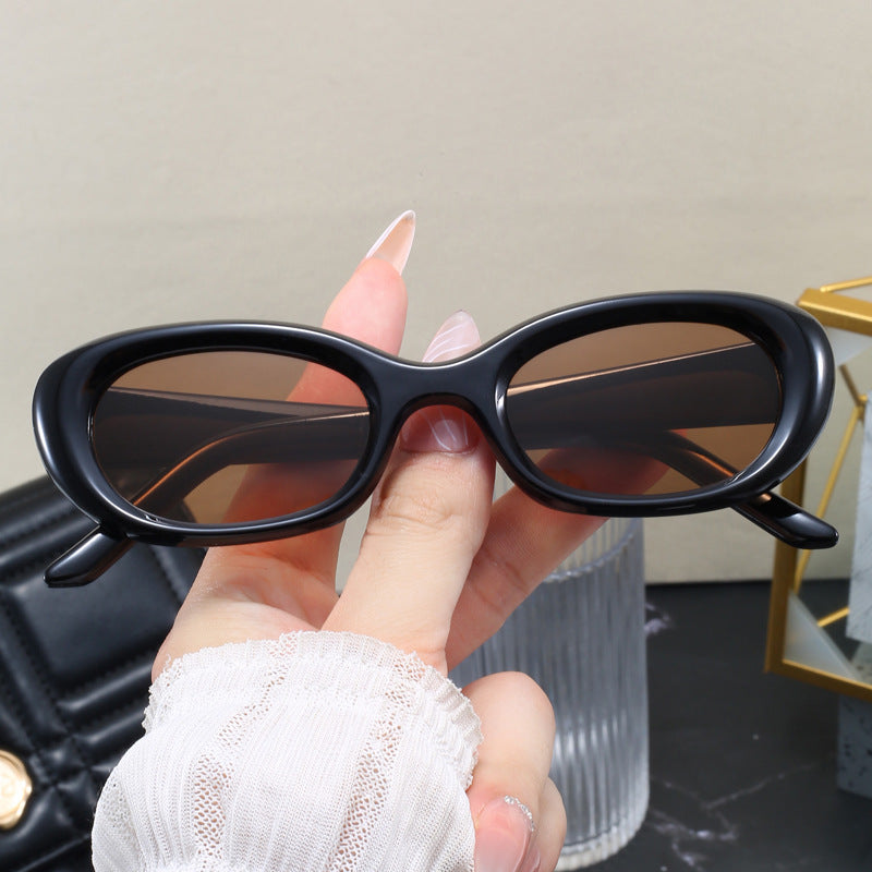 Women's fashionable sunglasses with oval design and UV protection Stornfield