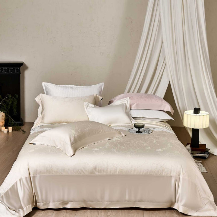 Satin bed linen set with floral jacquard texture and fine hem detail