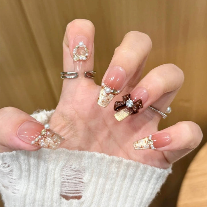 Artificial nail set with elegant appliqués Stornfield