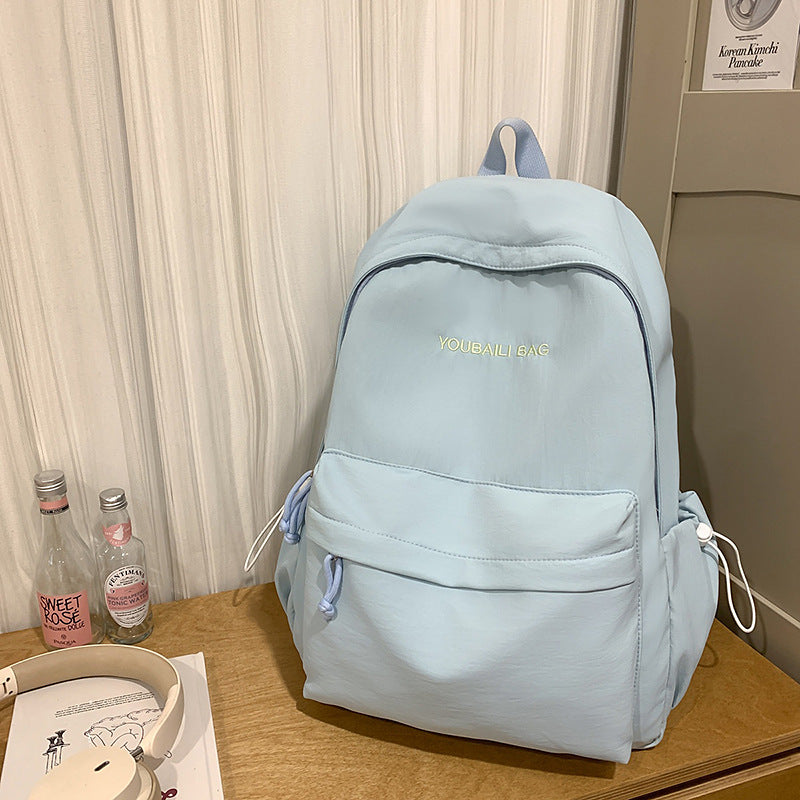 Lightweight Casual Backpack with Decorative Keychain Stornfield